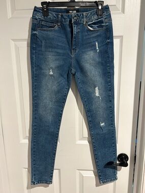 Wax Jean Women's Faded Blue Skinny Jeans with Distressed Accents